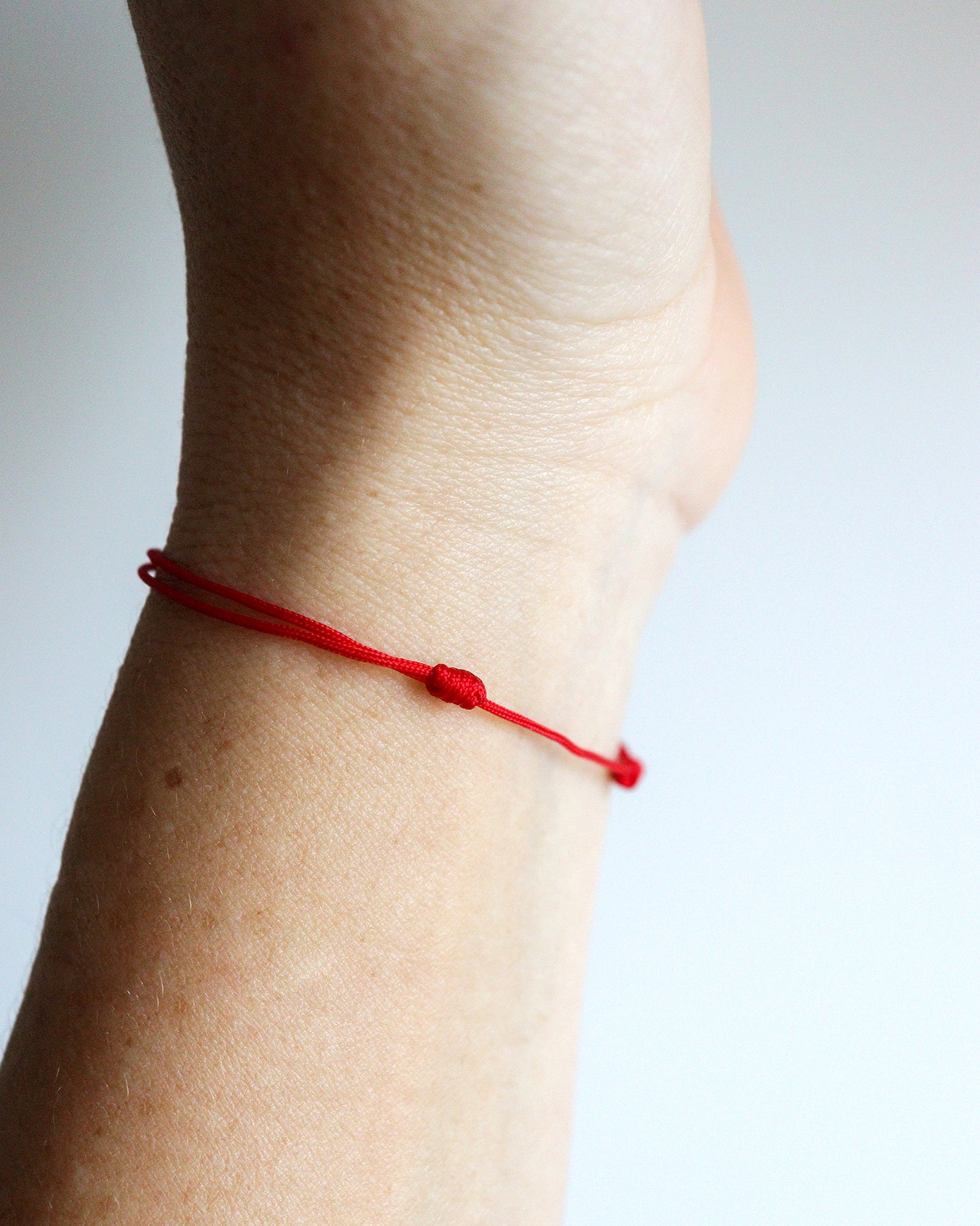 Pulsera de HILO ROJO